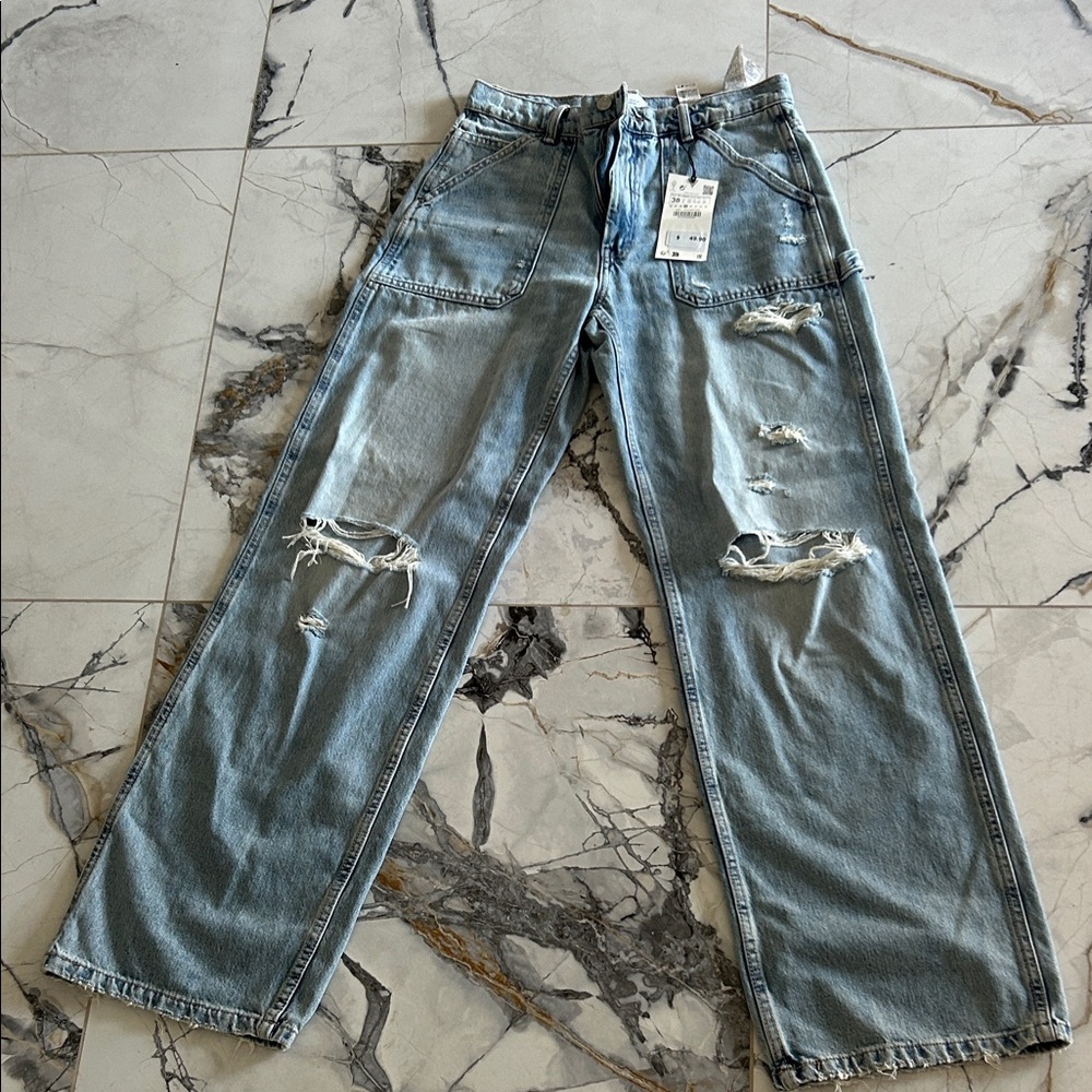 Zara women’s  Relaxed Fit Ripped Blue Jeans
